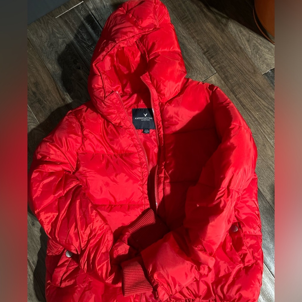 Womens American eagle red puffer jacket size small.